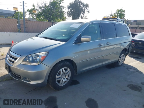 2007 Honda Odyssey EX-L with VIN 5FNRL38727B028976, listed as a IAAI auction lot 42138341 with 169,936 mi miles. Bid and sale history available at carsss.com. Image 2.