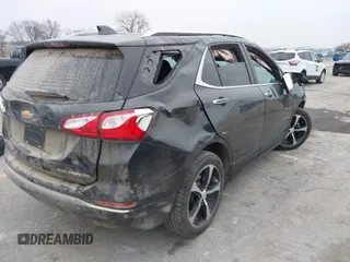 2021 Chevrolet Equinox Premier z VIN 2GNAXXEV2M6118116, wystawiony jako IAAI lot #41185151 z przebiegiem 91 837 mil mil oraz . Historia ofert i sprzedaży dostępna na DreamBid. Obrazek 4.
