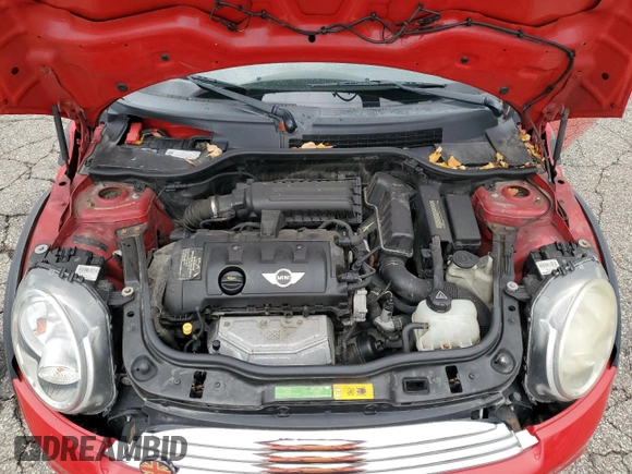 2011 MINI Convertible with VIN WMWZN3C51BTZ78331, listed as a Copart auction lot 73348304 with 94,219 mi miles and Salvage title. Bid and sale history available at DreamBid. Image 11.