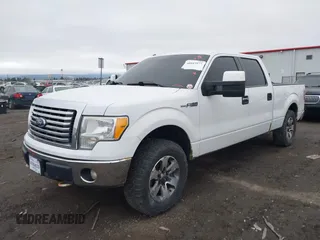 2011 Ford F-150 XL with VIN 1FTFW1EF9BFA00476, listed as a IAAI auction lot 40983977 with 189,294 mi miles. Bid and sale history available at carsss.com. Image 2.