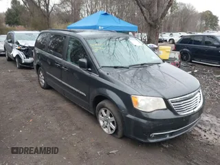 2011 Chrysler Town & Country Touring with VIN 2A4RR5DG1BR719701, listed as a IAAI auction lot 42023322 with 152,318 mi miles. Bid and sale history available at carsss.com. Image 1.