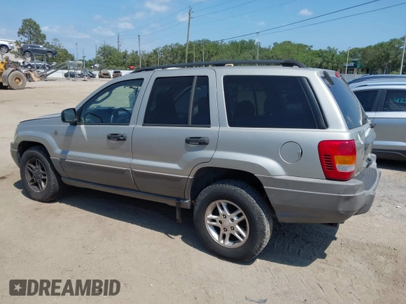 2004 Jeep Grand Cherokee Laredo z VIN 1J4GW48SX4C283922, wystawiony jako IAAI lot #42306869 z przebiegiem 263 812 mil mil oraz . Historia ofert i sprzedaży dostępna na DreamBid. Obrazek 13.