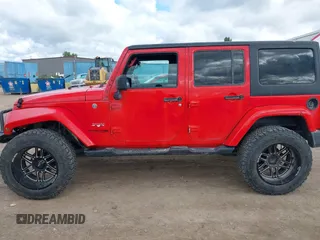 2018 Jeep Wrangler JK Unlimited Sahara with VIN 1C4HJWEG3JL893970, listed as a IAAI auction lot 39530074 with 72,079 mi miles. Bid and sale history available at carsss.com. Image 14.