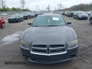 2014 Dodge Charger SE with VIN 2C3CDXBG8EH117241, listed as a IAAI auction lot 41952443 with 158,432 mi miles and . Bid and sale history available at DreamBid. Image 12.