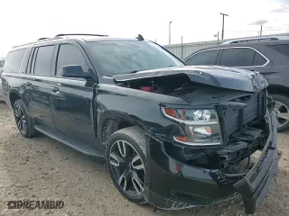 2019 Chevrolet Suburban LT with VIN 1GNSKHKC5KR291660, listed as a Copart auction lot 51587645 with 107,786 mi miles and Salvage Title. Bid and sale history available at carsss.com. Image 12.