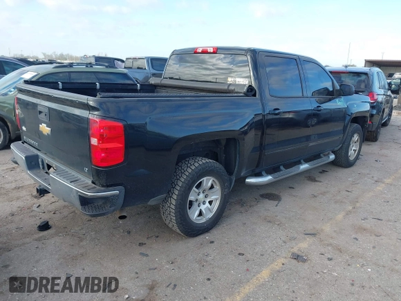 2015 Chevrolet Silverado 1500 LT with VIN 3GCPCREHXFG197272, listed as a IAAI auction lot 41755659 with 122,183 mi miles and . Bid and sale history available at DreamBid. Image 4.