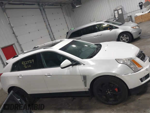 2012 Cadillac SRX Premium Collection with VIN 3GYFNFE39CS561614, listed as a IAAI auction lot 42529959 with 59,088 mi miles and . Bid and sale history available at DreamBid. Image 13.