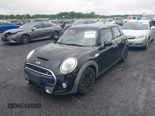 2015 MINI Hardtop 4 Door S with VIN WMWXU3C55F2B56429, listed as a IAAI auction lot 42335996 with 114,781 mi miles and . Bid and sale history available at DreamBid. Image 2.