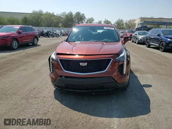 2021 Cadillac XT4 FWD Sport with VIN 1GYFZER49MF057541, listed as a Copart auction lot 70654544 with 35,441 mi miles and Non Repairable. Bid and sale history available at DreamBid. Image 14.
