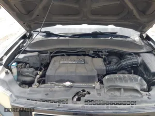 2007 Honda Ridgeline RTL w/Leather with VIN 2HJYK16527H515539, listed as a IAAI auction lot 42100067 with 186,864 mi miles. Bid and sale history available at carsss.com. Image 10.