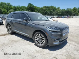 2020 Lincoln Aviator Reserve with VIN 5LM5J7WC1LGL17402, listed as a Copart auction lot 57256665 with Not provided miles and Salvage title. Bid and sale history available at DreamBid. Image 4.