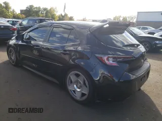 2022 Toyota Corolla Hatchback SE with VIN JTND4MBEXN3180370, listed as a Copart auction lot 74436644 with 57,563 mi miles and Salvage Title. Bid and sale history available at carsss.com. Image 2.
