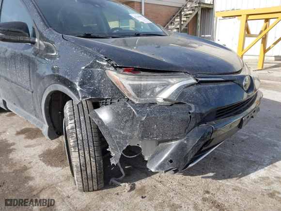 2016 Toyota RAV4 XLE with VIN 2T3WFREV7GW255784, listed as a IAAI auction lot 41266085 with 87,426 mi miles. Bid and sale history available at carsss.com. Image 6.