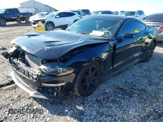 2019 Ford Mustang EcoBoost with VIN 1FA6P8TH8K5173458, listed as a IAAI auction lot 41085251 with 99,260 mi miles and . Bid and sale history available at carsss.com. Image 17.