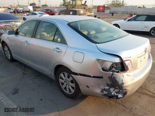 2007 Toyota Camry Hybrid with VIN JTNBB46K573027590, listed as a IAAI auction lot 41307314 with 159,168 mi miles. Bid and sale history available at carsss.com. Image 3.