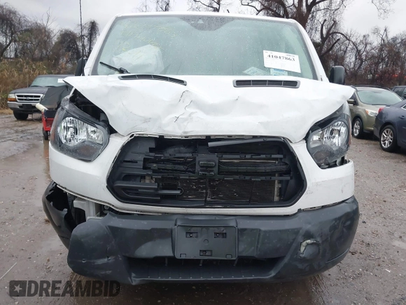 2017 Ford Transit z VIN 1FTYR1ZM2HKA27107, wystawiony jako IAAI lot #41047863 z przebiegiem 87 219 mil mil oraz . Historia ofert i sprzedaży dostępna na DreamBid. Obrazek 6.