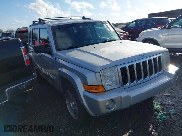 2010 Jeep Commander Sport z VIN 1J4RH4GK3AC158874, wystawiony jako IAAI lot #41708167 z przebiegiem 165 002 mil mil oraz . Historia ofert i sprzedaży dostępna na DreamBid. Obrazek 1.