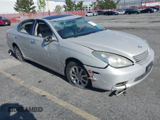 2004 Lexus ES 330 with VIN JTHBA30G240010487, listed as a IAAI auction lot 41627116 with 148,748 mi miles. Bid and sale history available at carsss.com. Image 1.