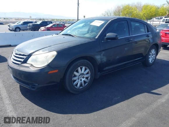 2010 Chrysler Sebring Touring with VIN 1C3CC4FB6AN207070, listed as a IAAI auction lot 42131880 with 155,362 mi miles. Bid and sale history available at carsss.com. Image 2.
