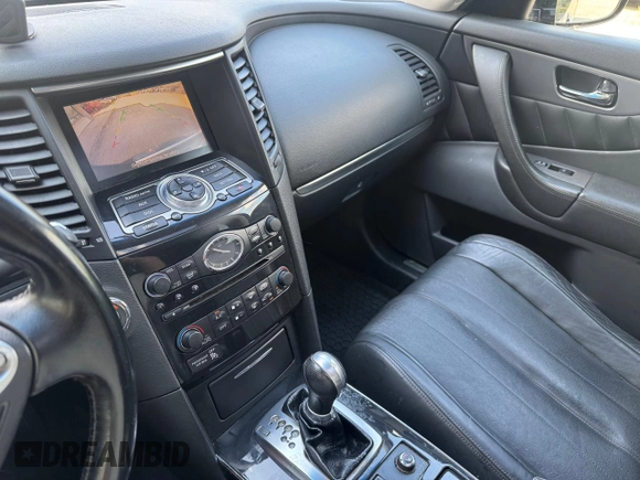 2014 Infiniti QX70 с VIN JN8CS1MW1EM411715, выставлен на аукционе Copart как лот 65465775 с пробегом 180 472 миль миль и Чистый • Clean title. История ставок и продаж доступна на DreamBid. Изображение 10.