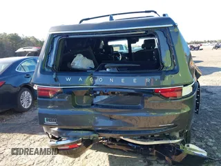 2022 Jeep Wagoneer Series II with VIN 1C4SJVBT0NS211883, listed as a IAAI auction lot 41829762 with 50,363 mi miles and . Bid and sale history available at DreamBid. Image 16.