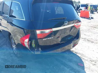 2011 Honda Odyssey EX-L with VIN 5FNRL5H67BB087064, listed as a IAAI auction lot 42326427 with 177,795 mi miles and . Bid and sale history available at DreamBid. Image 6.