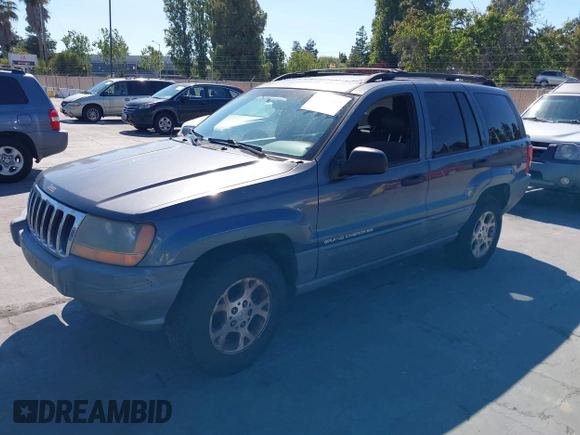 2001 Jeep Grand Cherokee Laredo with VIN 1J4GW48S31C550460, listed as a IAAI auction lot 42769410 with 261,640 mi miles and . Bid and sale history available at DreamBid. Image 2.