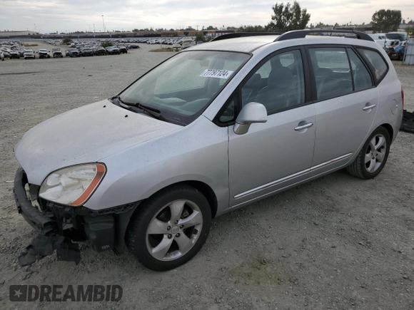 2009 Kia Rondo LX Base with VIN KNAFG528097222268, listed as a Copart auction lot 77797124 with 184,569 mi miles and Salvage Title. Bid and sale history available at carsss.com. Image 1.