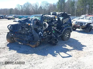 2020 Jeep Wrangler Unlimited Rubicon with VIN 1C4HJXFG2LW147242, listed as a IAAI auction lot 41630952 with Not provided miles and . Bid and sale history available at DreamBid. Image 2.
