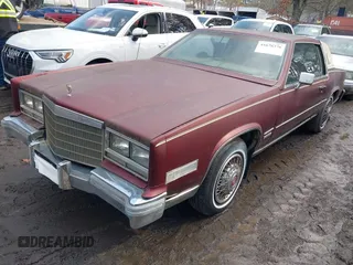 1982 Cadillac Eldorado z VIN 1G6AL578XCE604086, wystawiony jako IAAI lot #41676376 z przebiegiem 102 650 mil mil oraz . Historia ofert i sprzedaży dostępna na DreamBid. Obrazek 2.