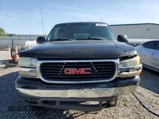 2003 GMC Yukon SLT z VIN 1GKEC13Z43R287134, wystawiony jako Copart lot #53506615 z przebiegiem 199 629 mil mil oraz Szkody całkowita. Historia ofert i sprzedaży dostępna na DreamBid. Obrazek 5.