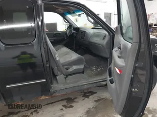 2000 Ford F-150 XL with VIN 1FTRX18W9YNB67215, listed as a IAAI auction lot 42558112 with 118,628 mi miles and . Bid and sale history available at DreamBid. Image 5.
