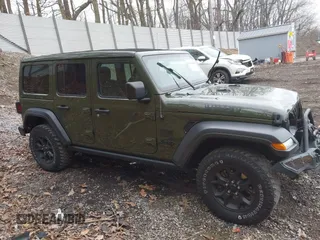 2021 Jeep Wrangler Unlimited Willys with VIN 1C4HJXDNXMW579595, listed as a IAAI auction lot 41930989 with 32,148 mi miles and . Bid and sale history available at DreamBid. Image 14.
