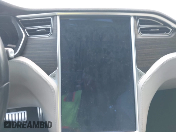 2014 Tesla Model S P85D with VIN 5YJSA1H29EFP63032, listed as a IAAI auction lot 42132145 with Not Provided miles and . Bid and sale history available at DreamBid. Image 14.