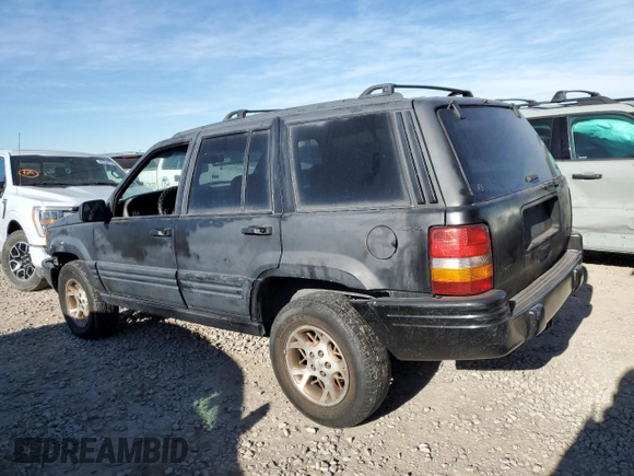 1997 Jeep Grand Cherokee Limited with VIN 1J4GZ78Y1VC563890, listed as a Copart auction lot 41910925 with 0 mi miles and Clean Title. Bid and sale history available at carsss.com. Image 2.