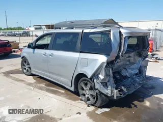2015 Toyota Sienna SE with VIN 5TDXK3DC7FS684341, listed as a IAAI auction lot 41959077 with 154,377 mi miles and . Bid and sale history available at DreamBid. Image 3.