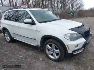 2009 BMW X5 30i with VIN 5UXFE43569L275733, listed as a IAAI auction lot 41897558 with 154,192 mi miles. Bid and sale history available at carsss.com. Image 1.