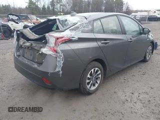 2019 Toyota Prius L Eco z VIN JTDKARFU7K3077941, wystawiony jako IAAI lot #41865759 z przebiegiem 254 612 mil mil oraz . Historia ofert i sprzedaży dostępna na DreamBid. Obrazek 4.