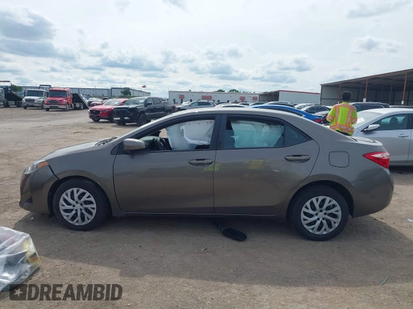 2018 Toyota Corolla L with VIN 2T1BURHE1JC983389, listed as a IAAI auction lot 42221142 with 79,113 mi miles and . Bid and sale history available at DreamBid. Image 14.