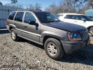 2004 Jeep Grand Cherokee Laredo with VIN 1J4GX48N14C435481, listed as a Copart auction lot 87855975 with 176,273 mi miles and Salvage Title. Bid and sale history available at carsss.com. Image 4.