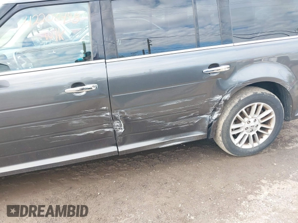2016 Ford Flex SEL z VIN 2FMGK5C82GBA21945, wystawiony jako IAAI lot #42206498 z przebiegiem 141 320 mil mil oraz . Historia ofert i sprzedaży dostępna na DreamBid. Obrazek 6.