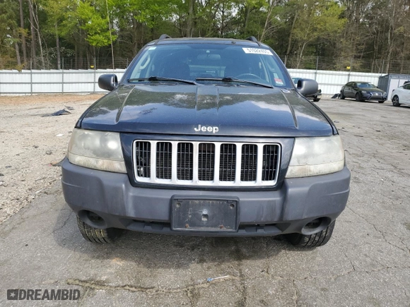 2004 Jeep Grand Cherokee Laredo with VIN 1J4GW48S44C100529, listed as a Copart auction lot 51022405 with 169,966 mi miles and Clean Title. Bid and sale history available at carsss.com. Image 5.