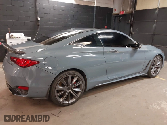 2022 Infiniti Q60 Red Sport 400 with VIN JN1FV7LL4NM681132, listed as a IAAI auction lot 40733343 with 14,309 mi miles and . Bid and sale history available at DreamBid. Image 4.