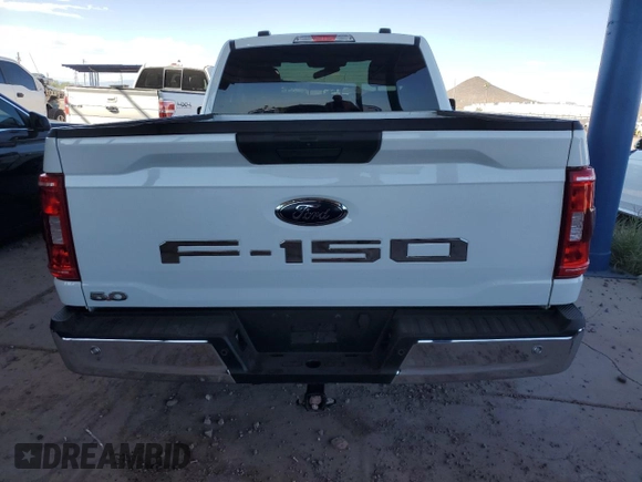 2022 Ford F-150 XL with VIN 1FTMF1C5XNKD23707, listed as a Copart auction lot 70062144 with 58,649 mi miles and Salvage title. Bid and sale history available at DreamBid. Image 6.