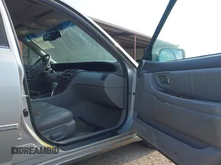 2002 Toyota Avalon XL with VIN 4T1BF28B82U249629, listed as a IAAI auction lot 42052410 with 245,314 mi miles and . Bid and sale history available at DreamBid. Image 5.