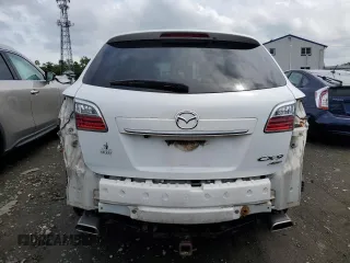 2012 Mazda CX-9 Grand Touring with VIN JM3TB3DV9C0338460, listed as a Copart auction lot 59548495 with 219,060 mi miles and Salvage title. Bid and sale history available at DreamBid. Image 6.