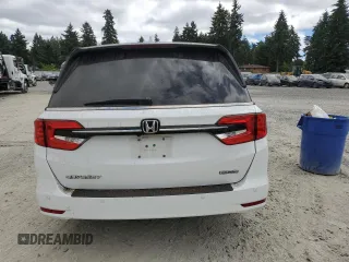2022 Honda Odyssey Touring with VIN 5FNRL6H8XNB016064, listed as a Copart auction lot 65289595 with 24,946 mi miles and Salvage title. Bid and sale history available at DreamBid. Image 6.