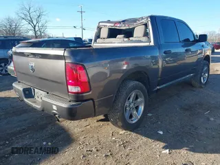 2015 Ram 1500 Express z VIN 1C6RR6KT6FS754869, wystawiony jako IAAI lot #41240025 z przebiegiem 203 775 mil mil oraz . Historia ofert i sprzedaży dostępna na DreamBid. Obrazek 4.