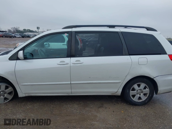 2010 Toyota Sienna XLE with VIN 5TDYK4CCXAS315235, listed as a IAAI auction lot 41451211 with 190,189 mi miles and . Bid and sale history available at carsss.com. Image 14.