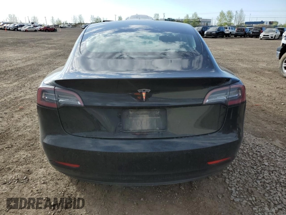 2019 Tesla Model 3 Mid Range z VIN 5YJ3E1EA7KF420025, wystawiony jako Copart lot #56149015 z przebiegiem 253 771 mil mil oraz Szkoda całkowita • Salvage title. Historia ofert i sprzedaży dostępna na DreamBid. Obrazek 6.